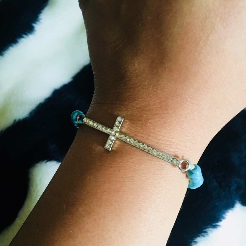 NWOT turquoise cross bracelet with rhinestones OS